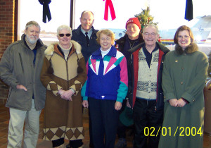 2004.25 - Denny & Marg May, RCMP Pilot Jerry Klammer & Nick Lees in back, Gloria & Bob Horner & Teresa Williams - Peace River, Jan 02 2004